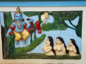 Maalaus Krishnasta ja gopi-tytöistä Keralassa. 