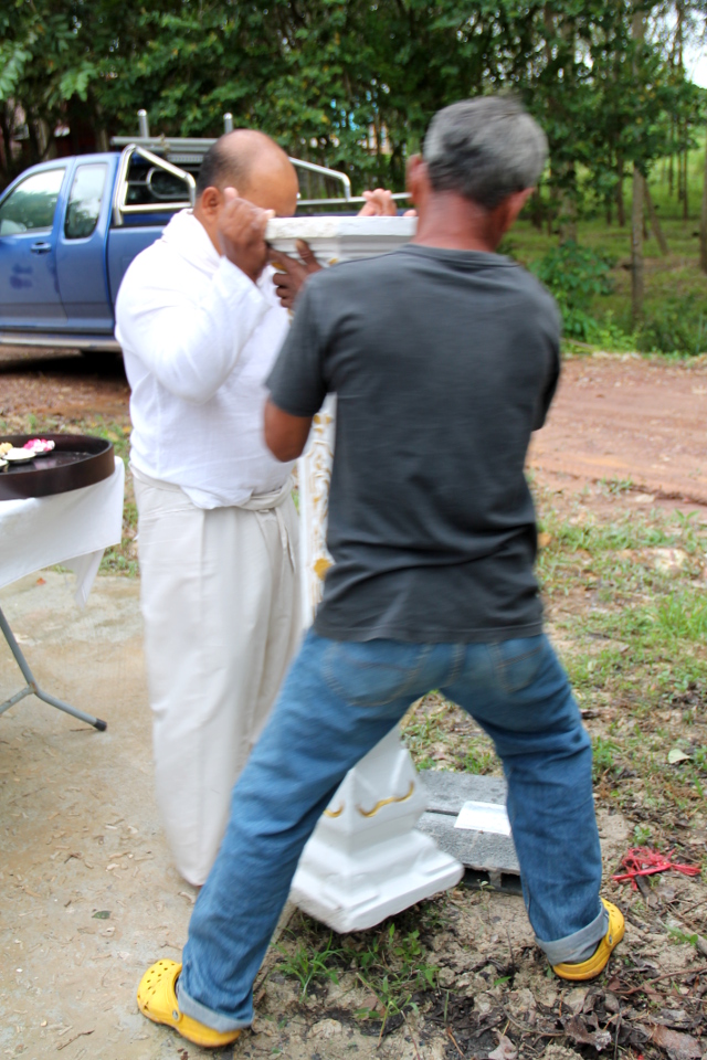 Henkien talon laitto paikoilleen. 